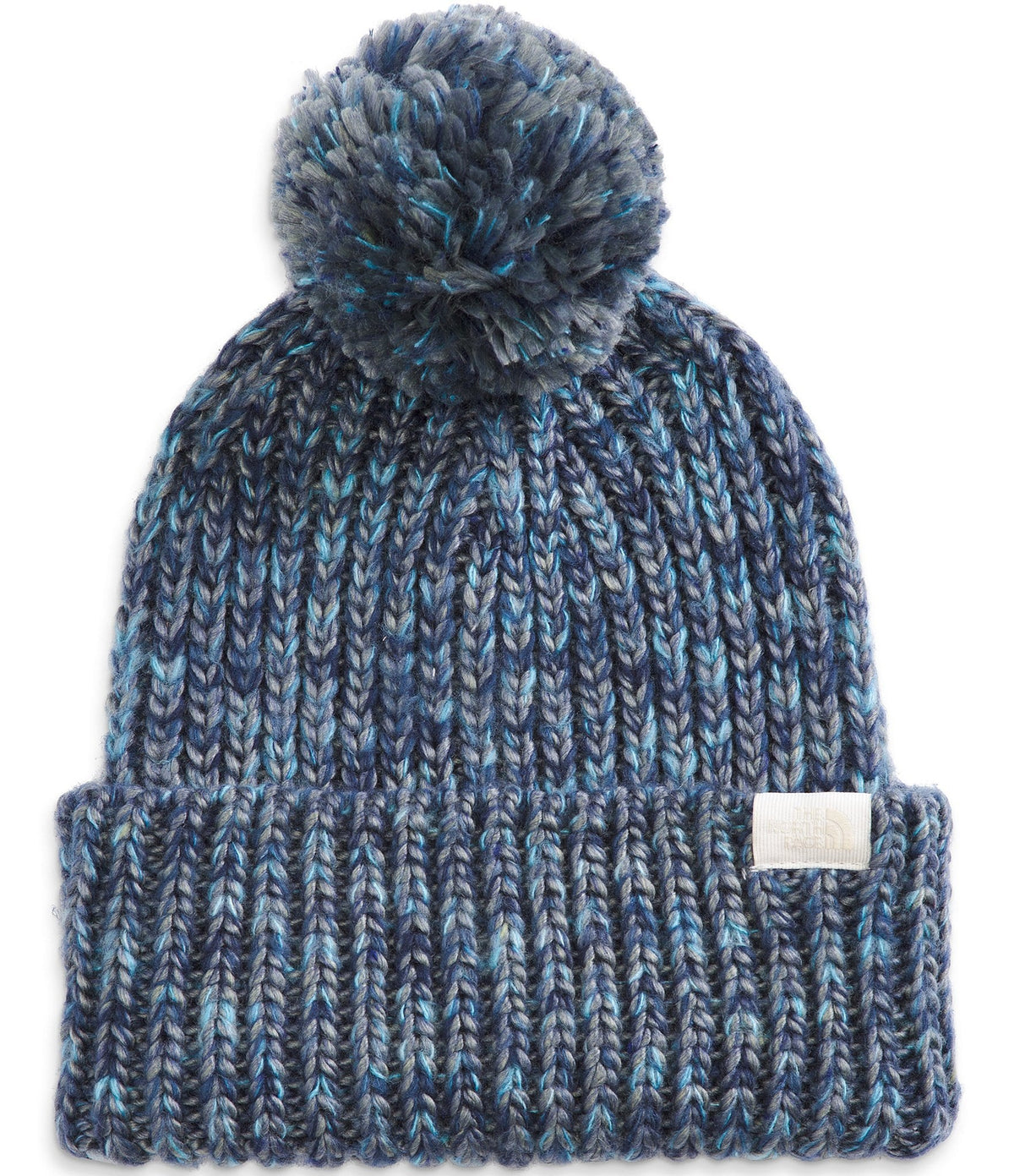 The North Face women's chunky knit beanie in blue with ribbed cuff and pom-pom