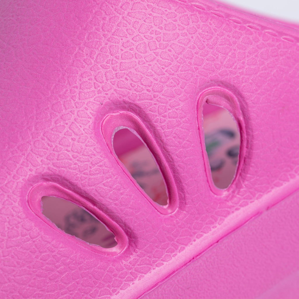 Pink slide sandals with oval cutout design on the strap