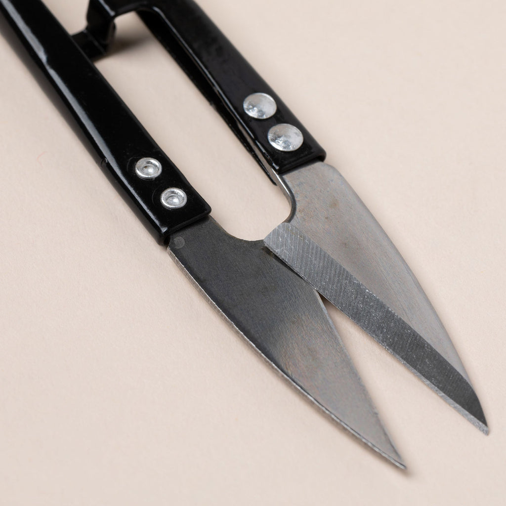 Black-handled gardening scissors with three blades and silver fasteners