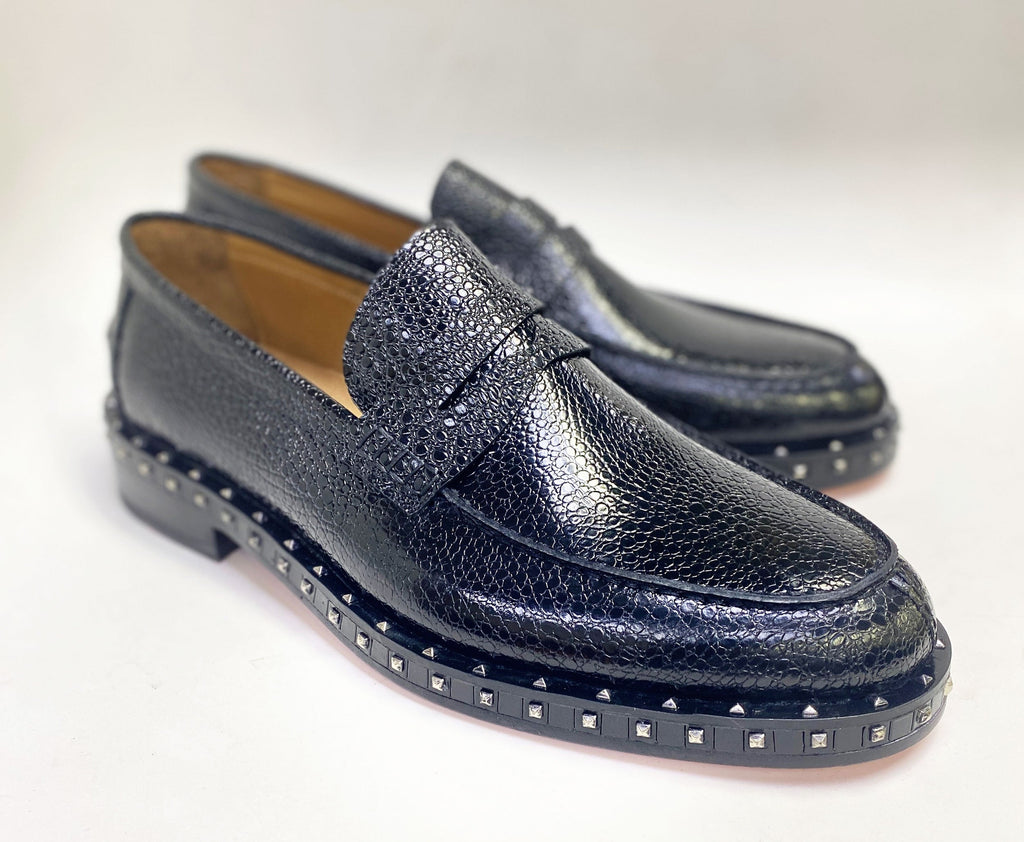 Textured caviar leather loafer with studded platform sole and dark blue-black tone