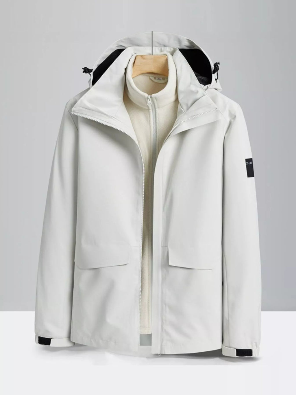 White zip-up hooded waterproof jacket with front pockets