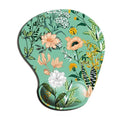 Ergonomic mouse pad with wrist rest, green floral garden print with peach flowers and yellow details