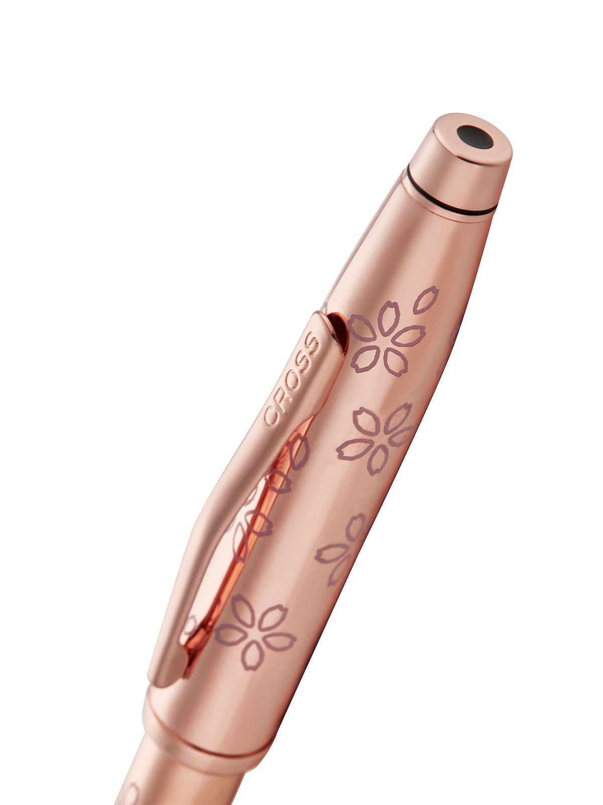 Rose gold plated ballpoint pen barrel close-up with cherry blossom motifs