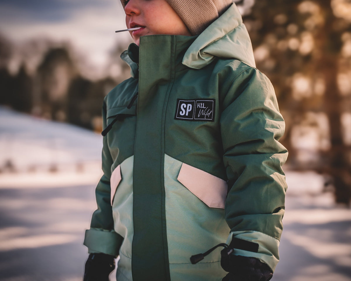 Toddler waterproof snowsuit in dark green with attached hood and front zipper