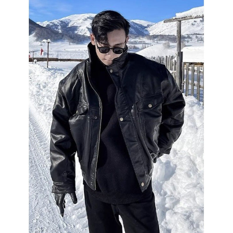 Men's black leather jacket with stand collar and snap buttons, chest flap pockets