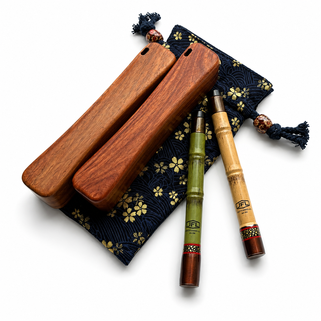 Pocket travel fishing kit with dark blue floral pouch, tan wooden case, and green rods