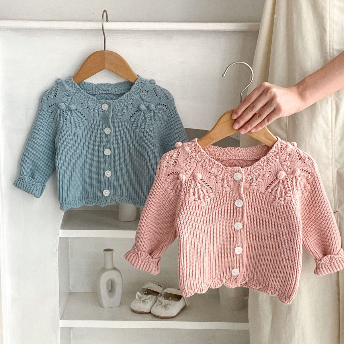 Baby knitted lace wool cardigans in pink and blue, button-front long sleeves
