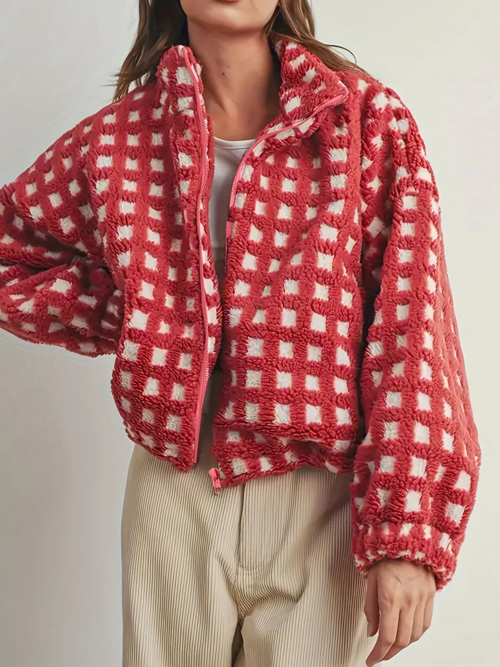 Red plaid sherpa zip-up jacket with front zipper placket and fuzzy fleece finish