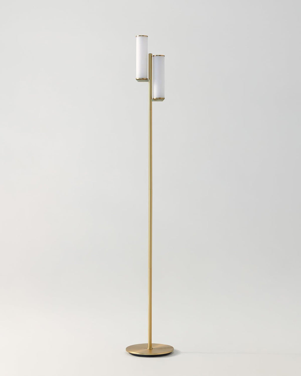 Brass floor lamp with two frosted glass cylinders and round base