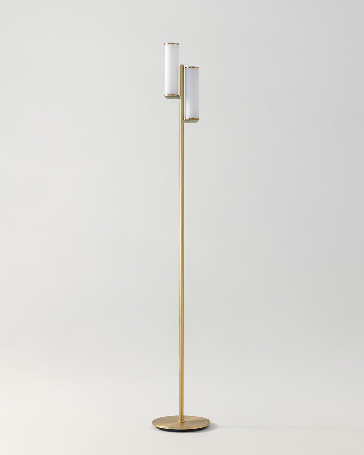 Brass floor lamp with two frosted glass cylinders and round base