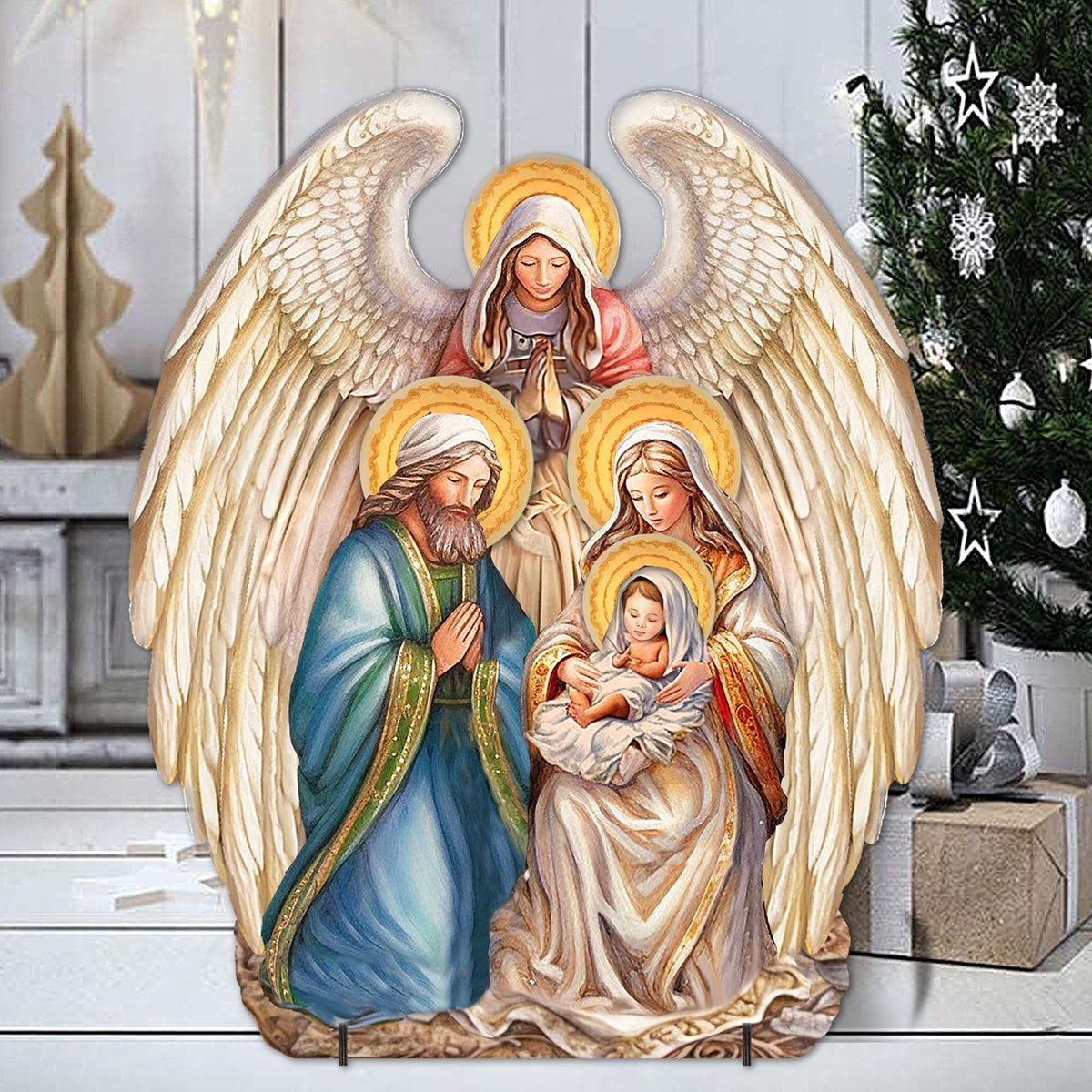 Nativity outdoor decor with painted nativity scene and large gold angel wings