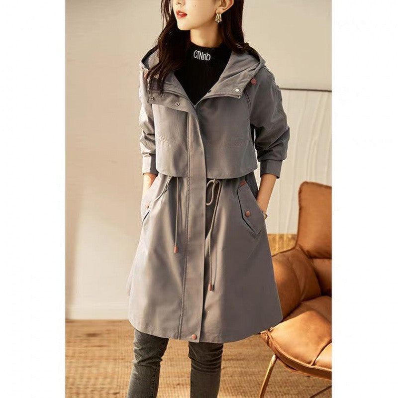 Women's hooded windbreaker coat in smoky gray, drawstring waist, button front, flap pockets