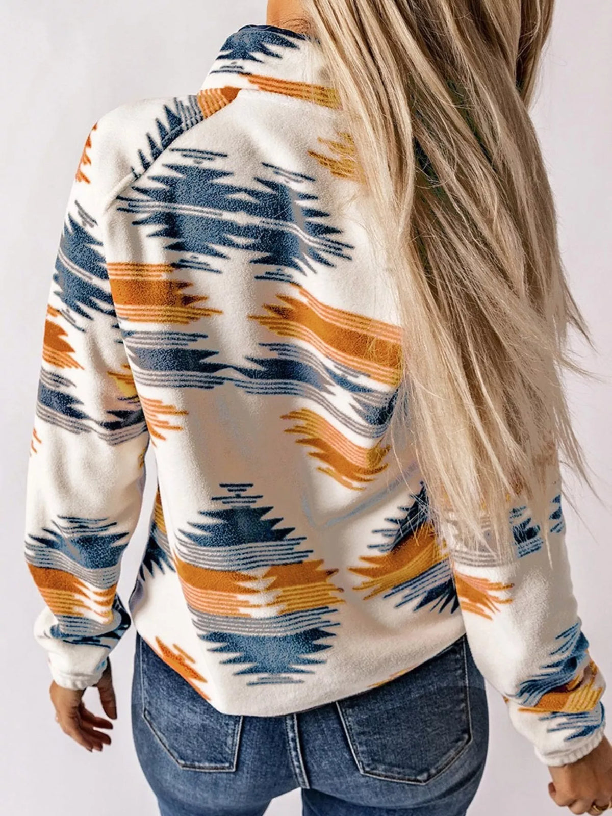 Geometric snap-down jacket back view in blue with orange and navy geometric stripe print