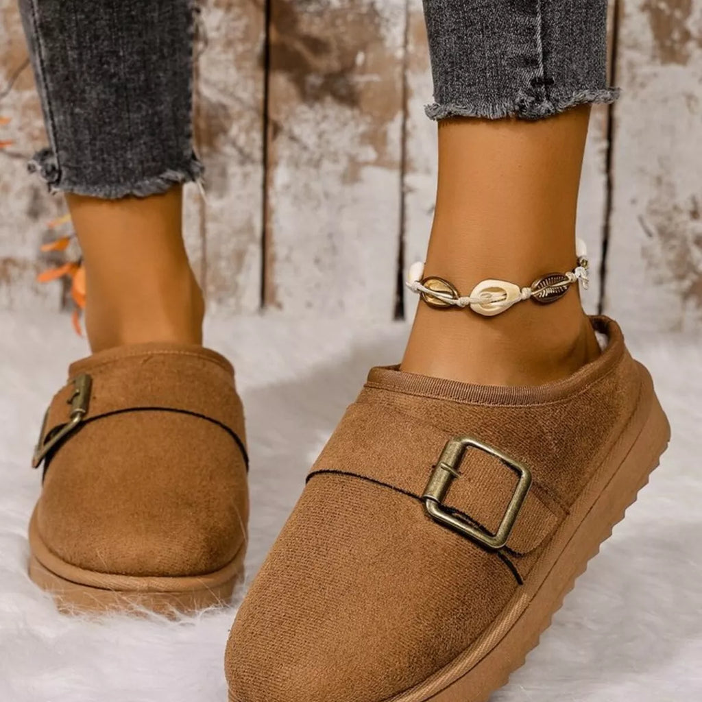 Caramel plush-lined slippers with metal buckle strap and decorative chain detail
