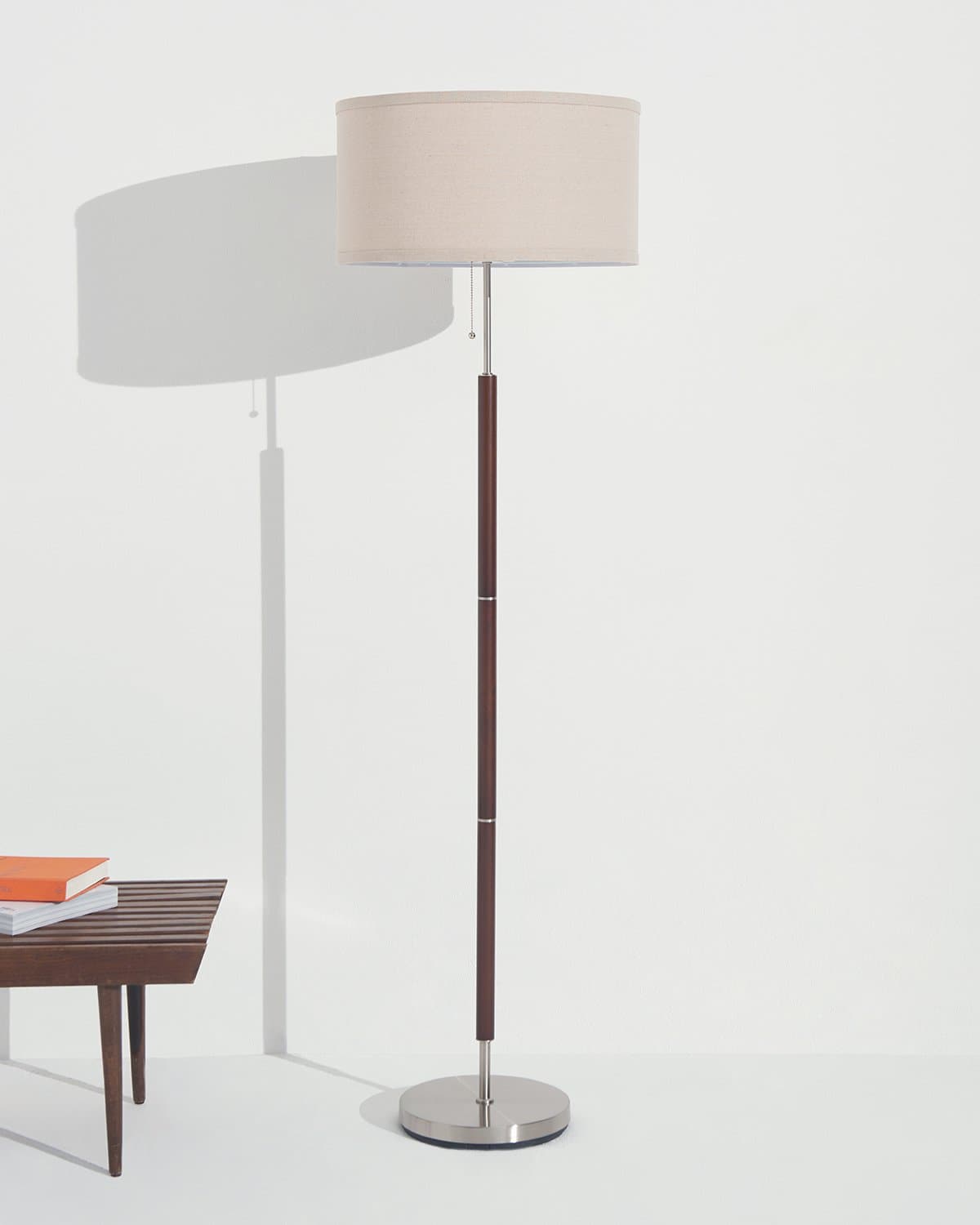 Carter floor lamp with beige drum shade and dark bronze vertical pole