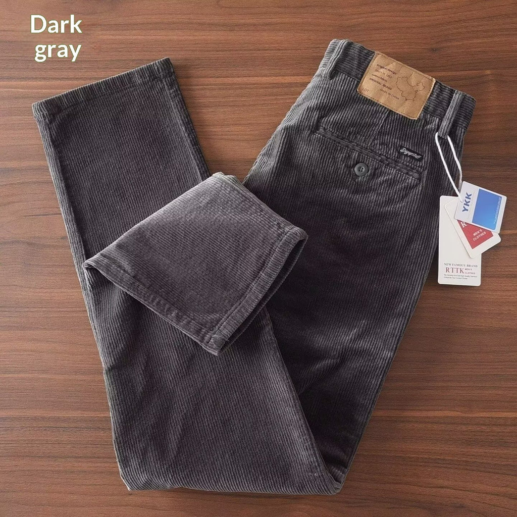 Men's corduroy straight-leg trousers in dark gray with zip fly and button closure