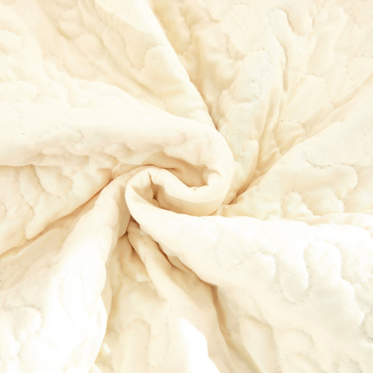 Cream quilted fabric backside with stitched texture