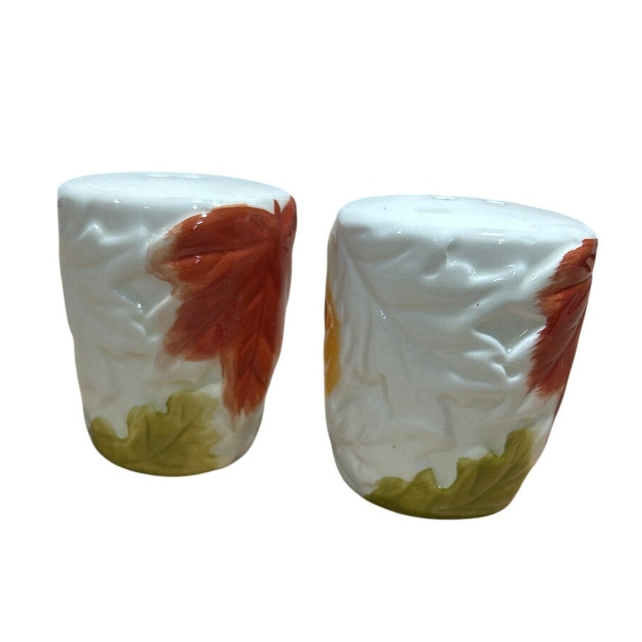 Ceramic salt and pepper shaker set, white sides with red maple-style leaf artwork