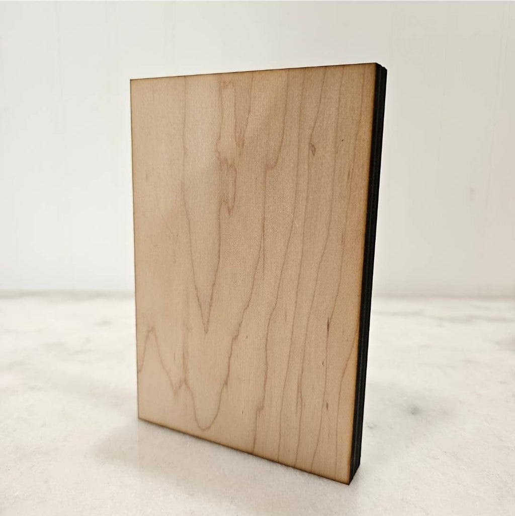 Rectangular wood block sign back with natural wood grain and dark border