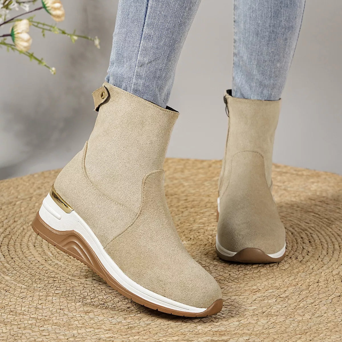 Beige suede ankle boots with wedge heel, side zipper and cushioned collar