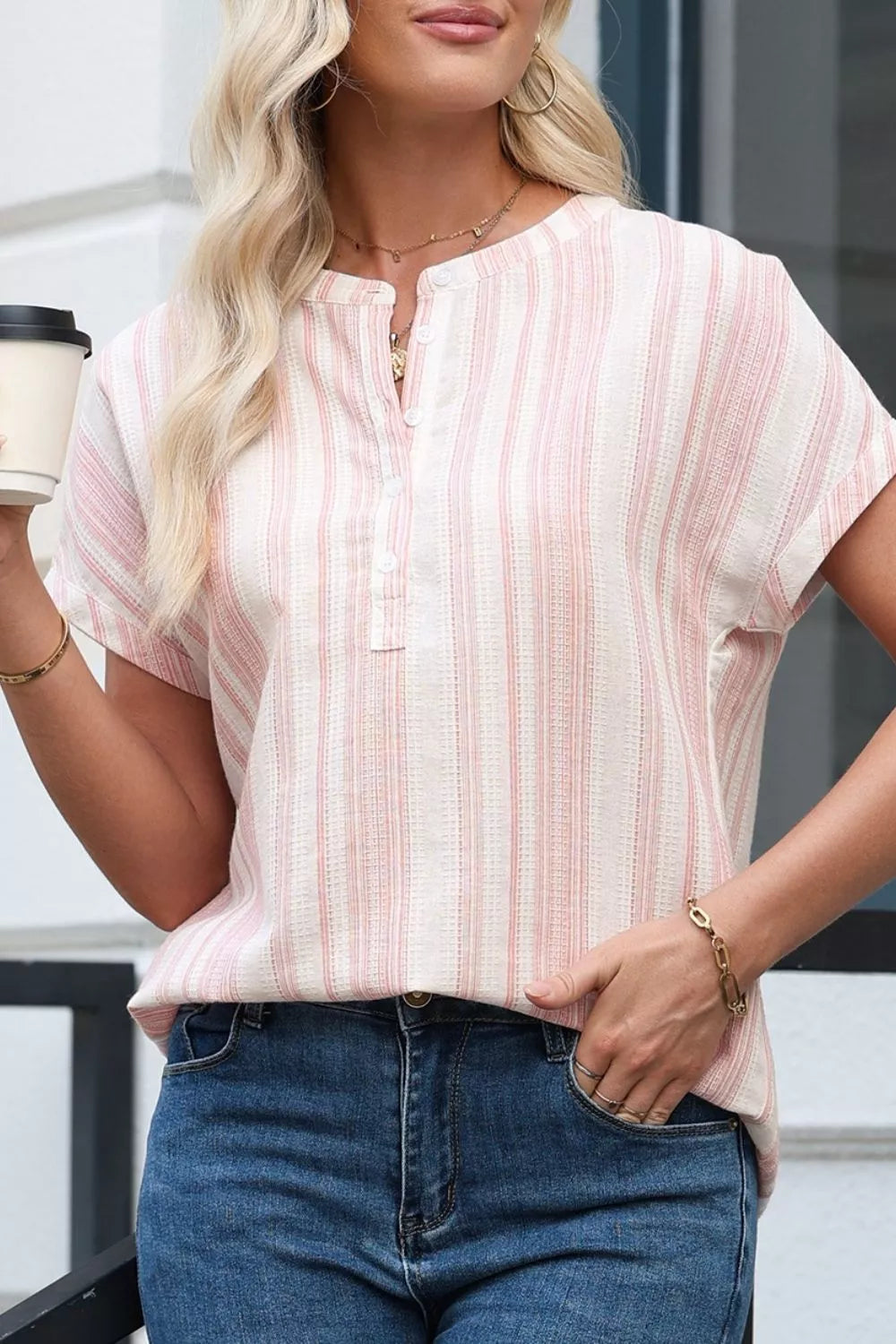 Dusty pink striped short-sleeve blouse with front button placket detail