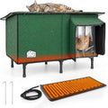 Green heated cat house with covered doorway, clear flap, raised legs, heating pad, and cord