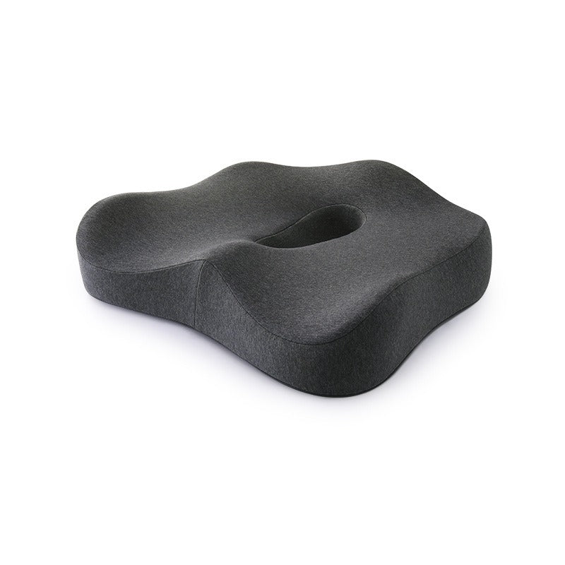 Dark gray memory foam seat cushion with contoured top and central cutout