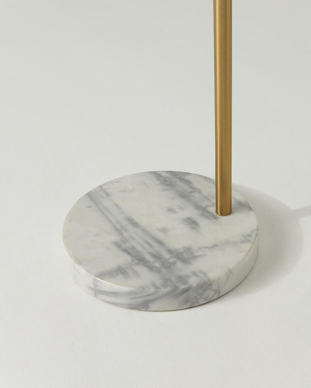 Marble-look round base for gold-tone floor lamp stand