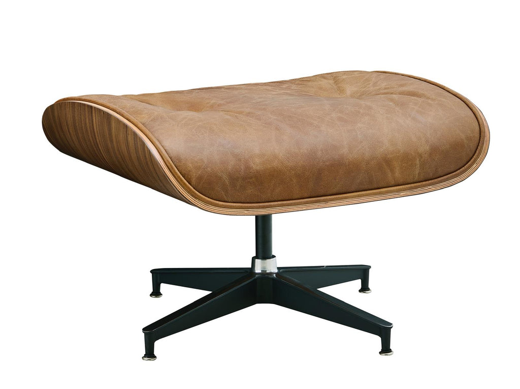 Tan leather ottoman with arched edges and black star-shaped swivel base
