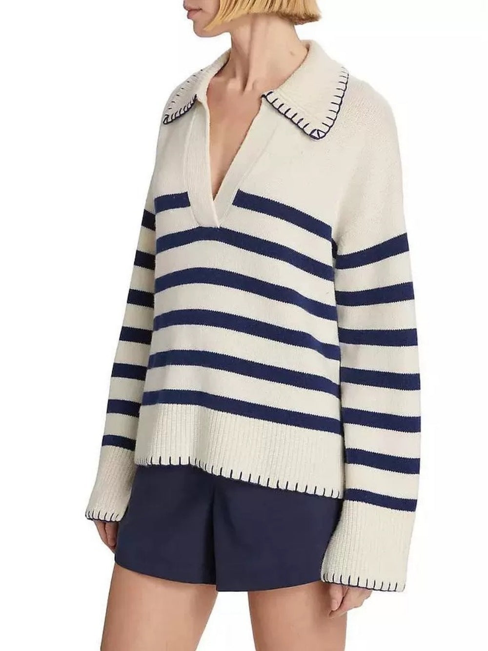 Women’s striped knit polo pullover with cream base, navy-and-white stripes, ribbed cuffs
