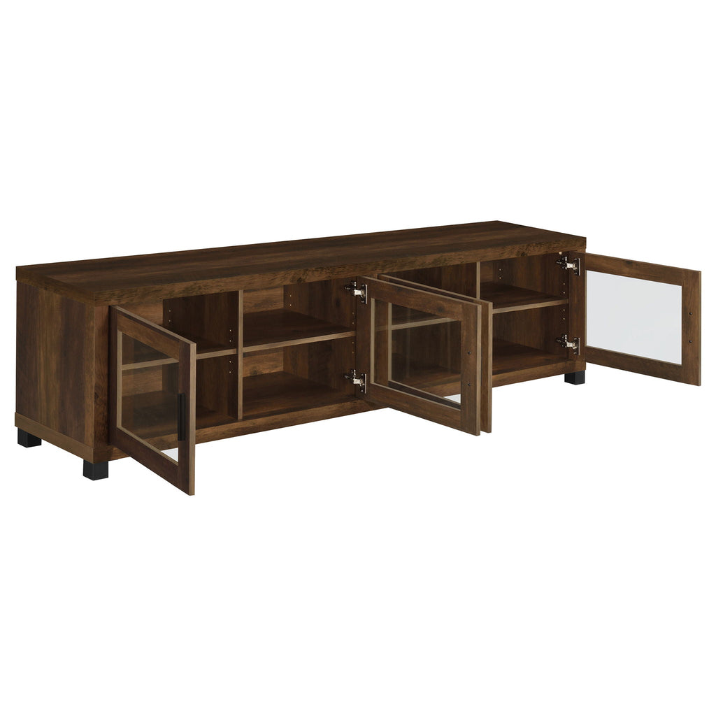 Dark pine TV stand with side swing door open, showing internal shelves; black feet, metal hardware