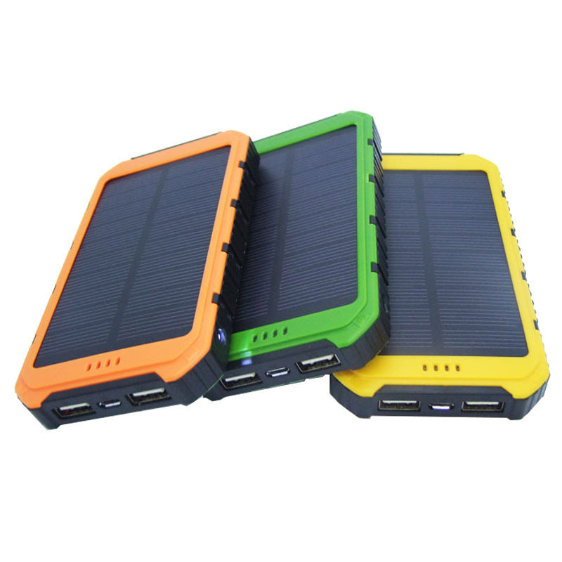 Orange, green and yellow solar portable power bank with fold-out panels and USB ports