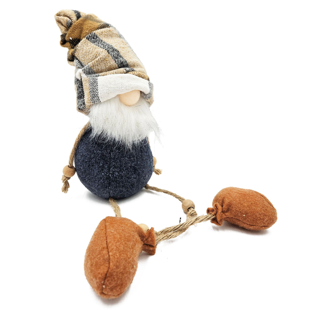 Hanging gnome ornament with plaid cap, white beard, dark navy body, brown feet