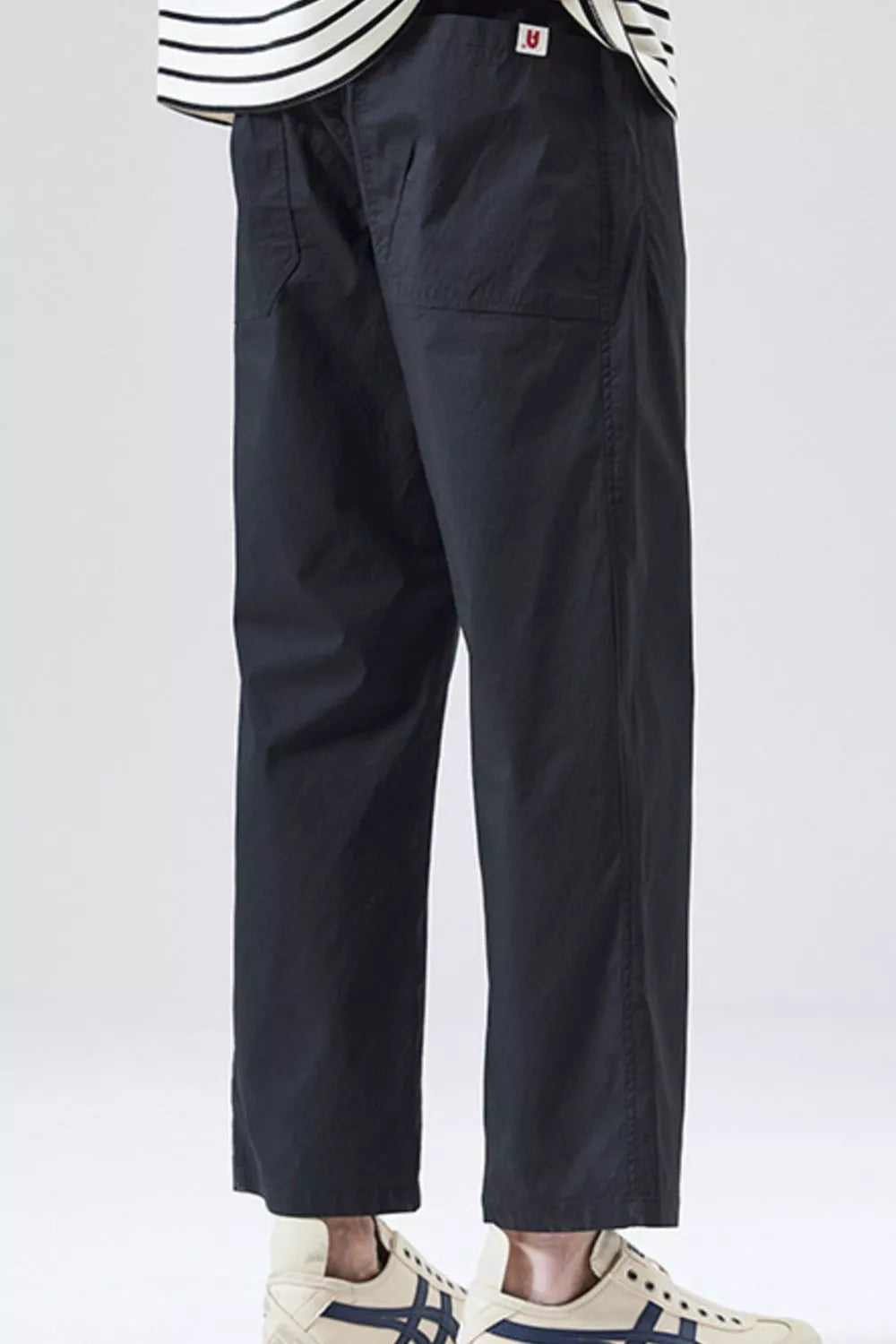 Men's black cropped loose-fit pants, side pockets and tapered hem