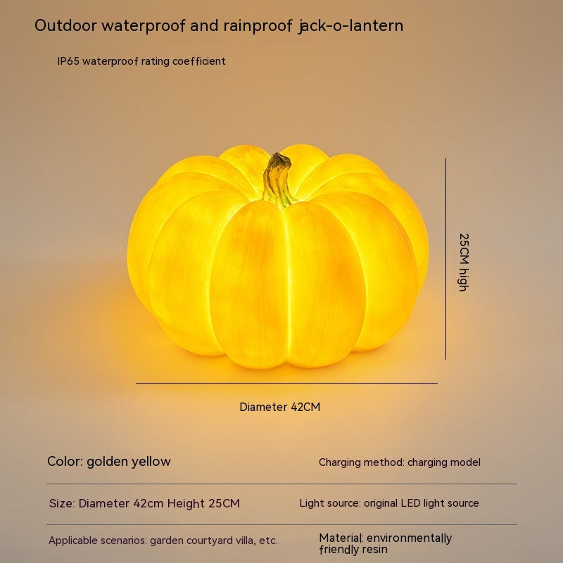 Golden yellow large pumpkin-shaped outdoor LED light with hanging loop, size shown