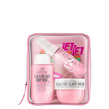Travel body care set with pink body wash and cream bottles in a clear zip pouch