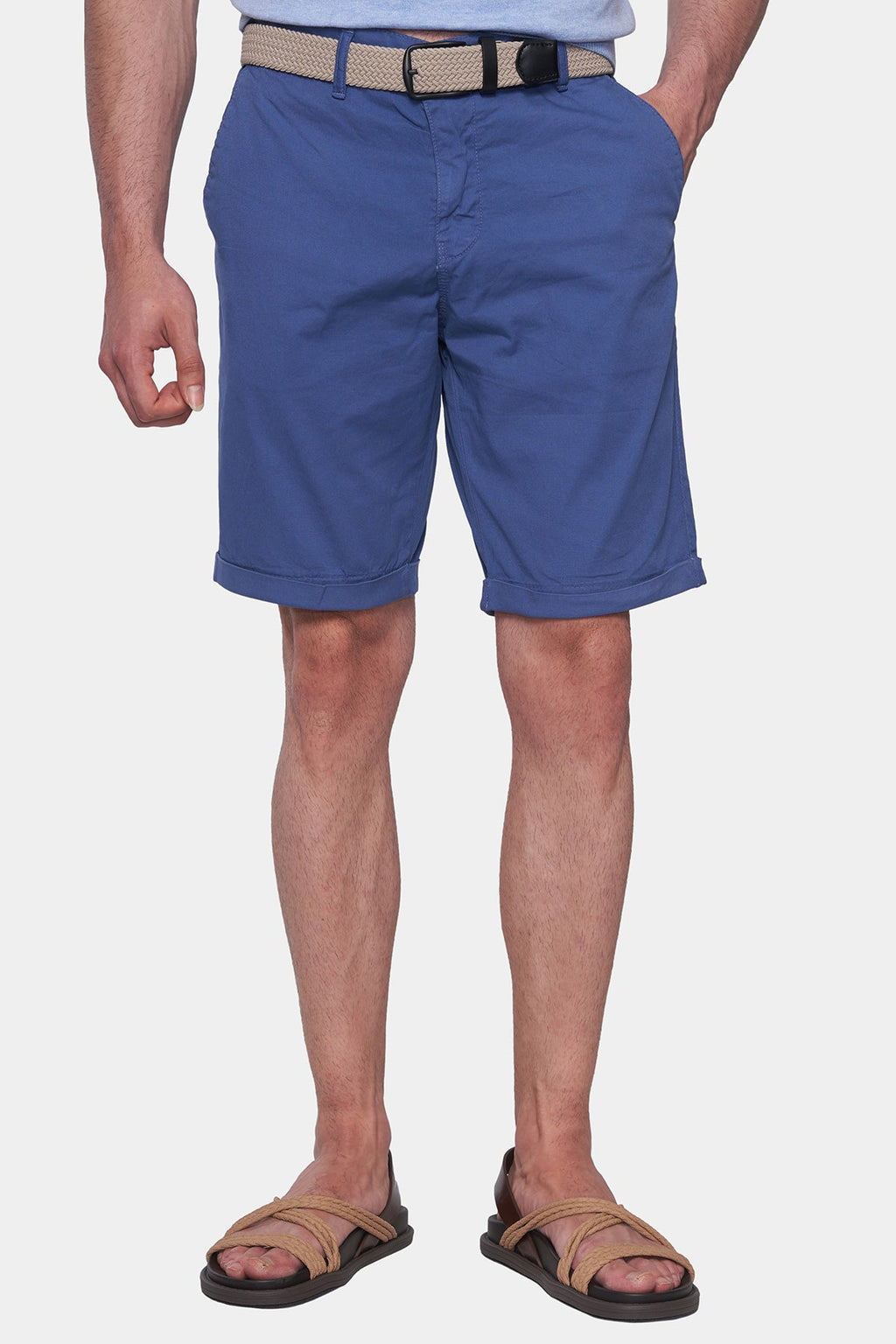 Blue knee-length shorts with belt loops, zip fly, and side pockets.