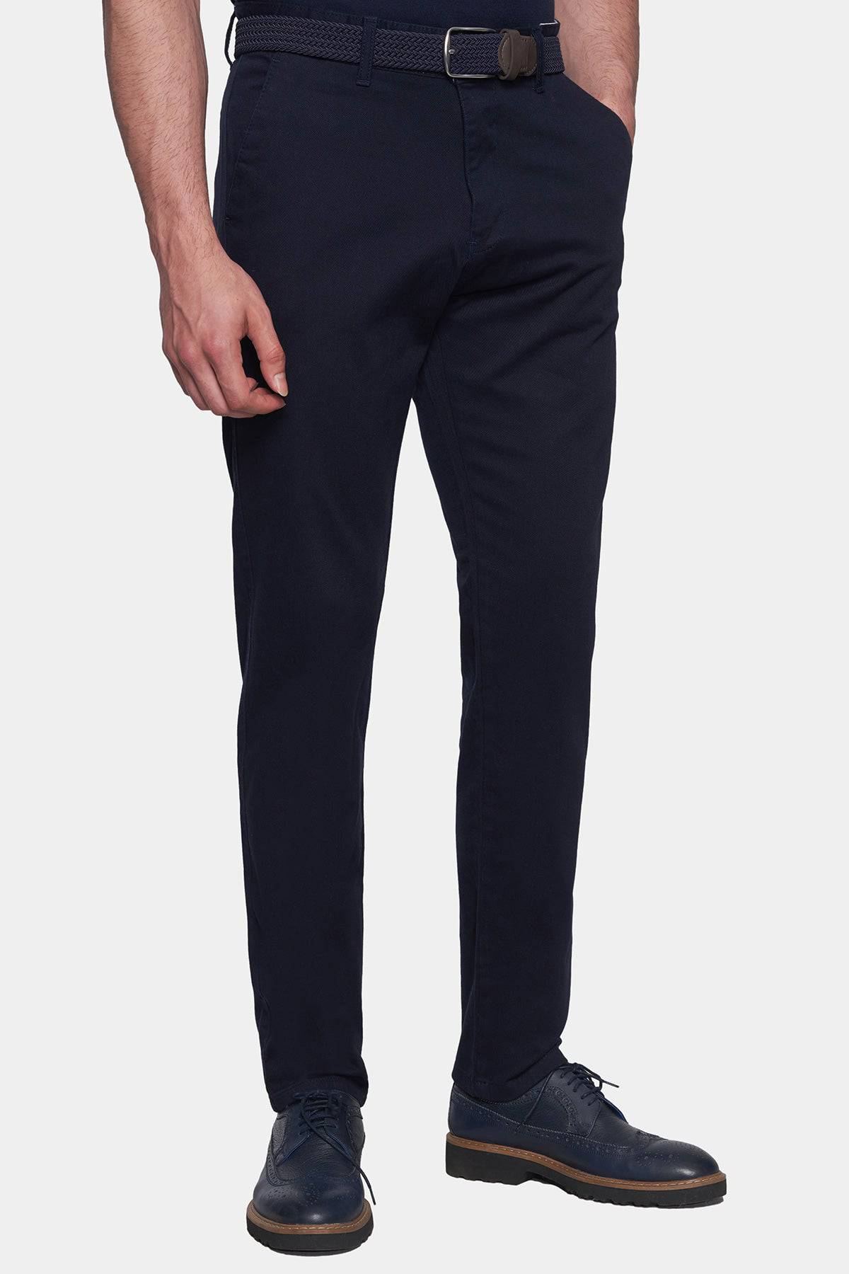 Navy chino pants with belt loops, zip fly, and straight legs