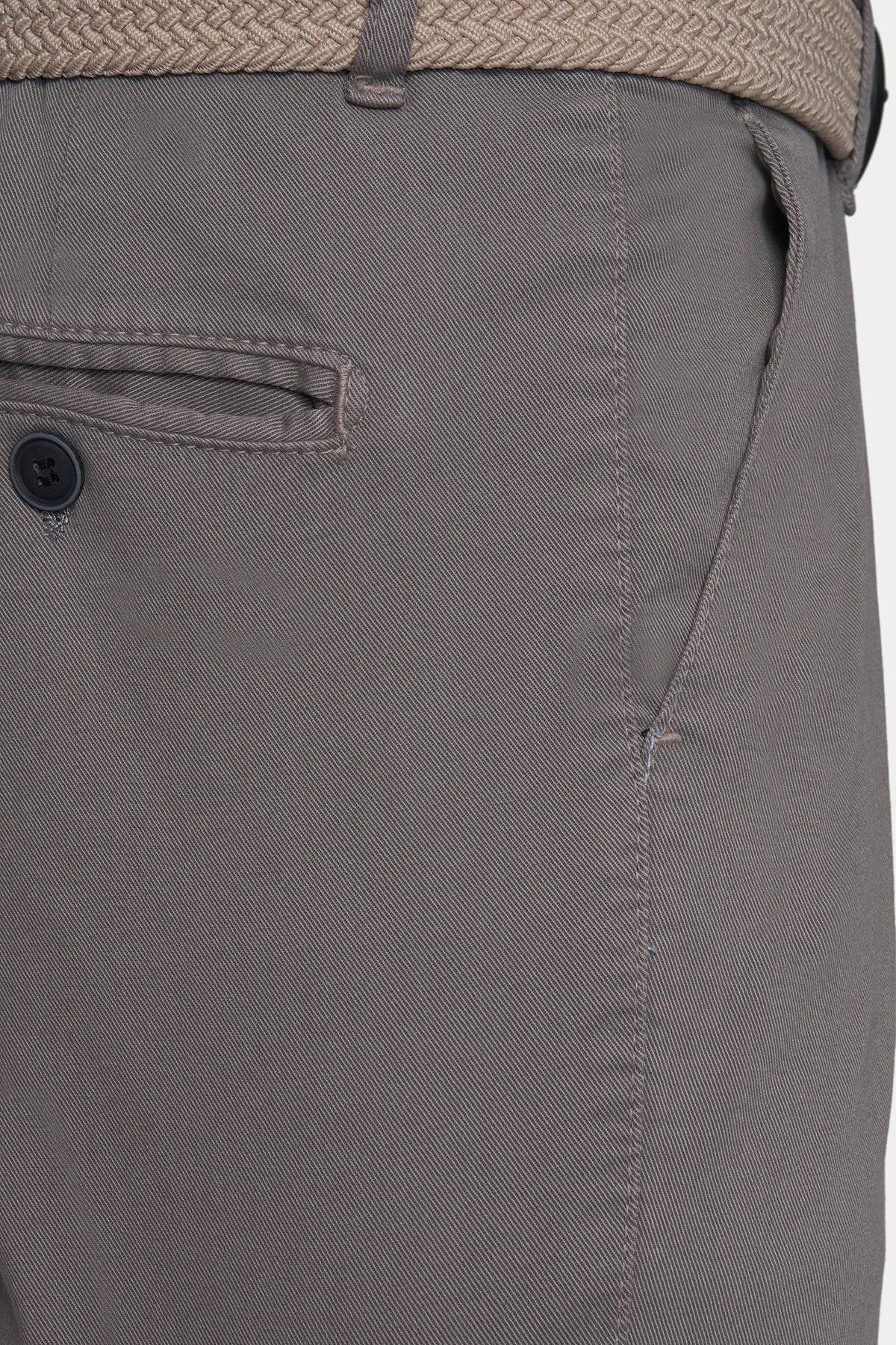 Graphite chino pocket with button closure and visible stitching detail