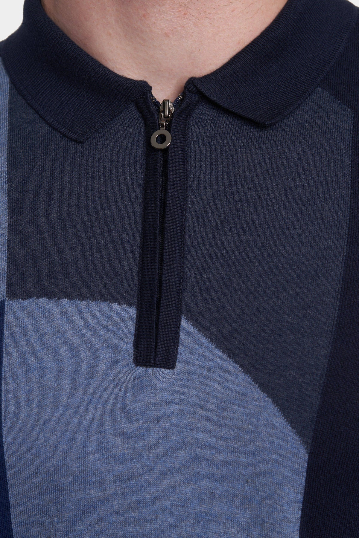 Navy cotton polo with half-zip placket and metal ring pull