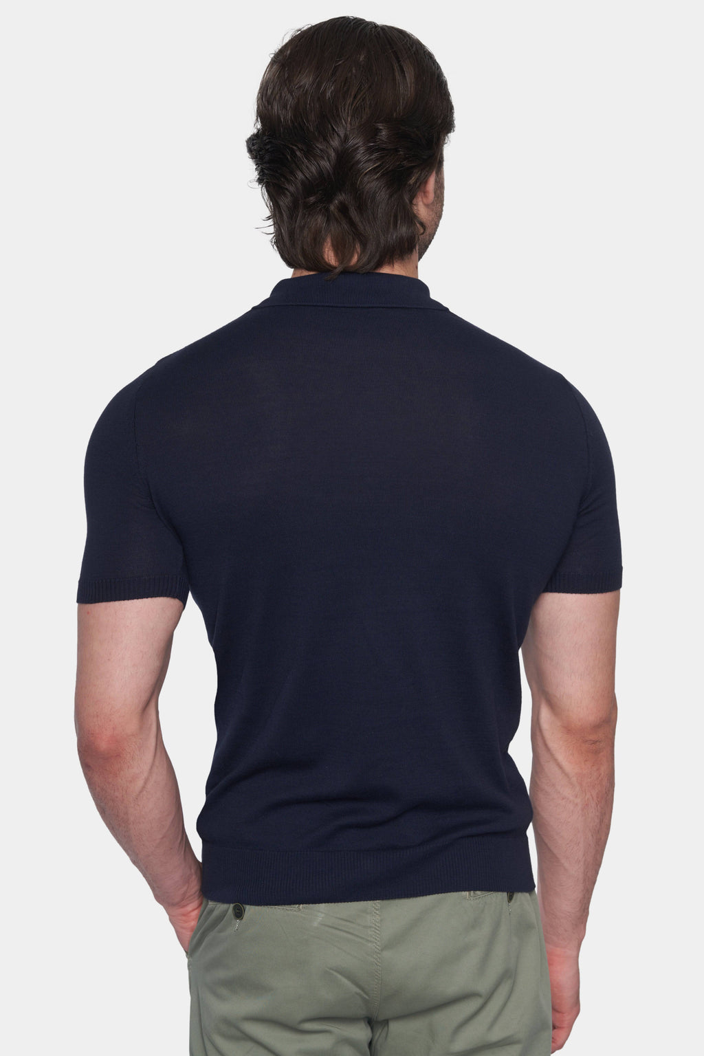 Men's dark blue polo shirt, back view, short sleeves