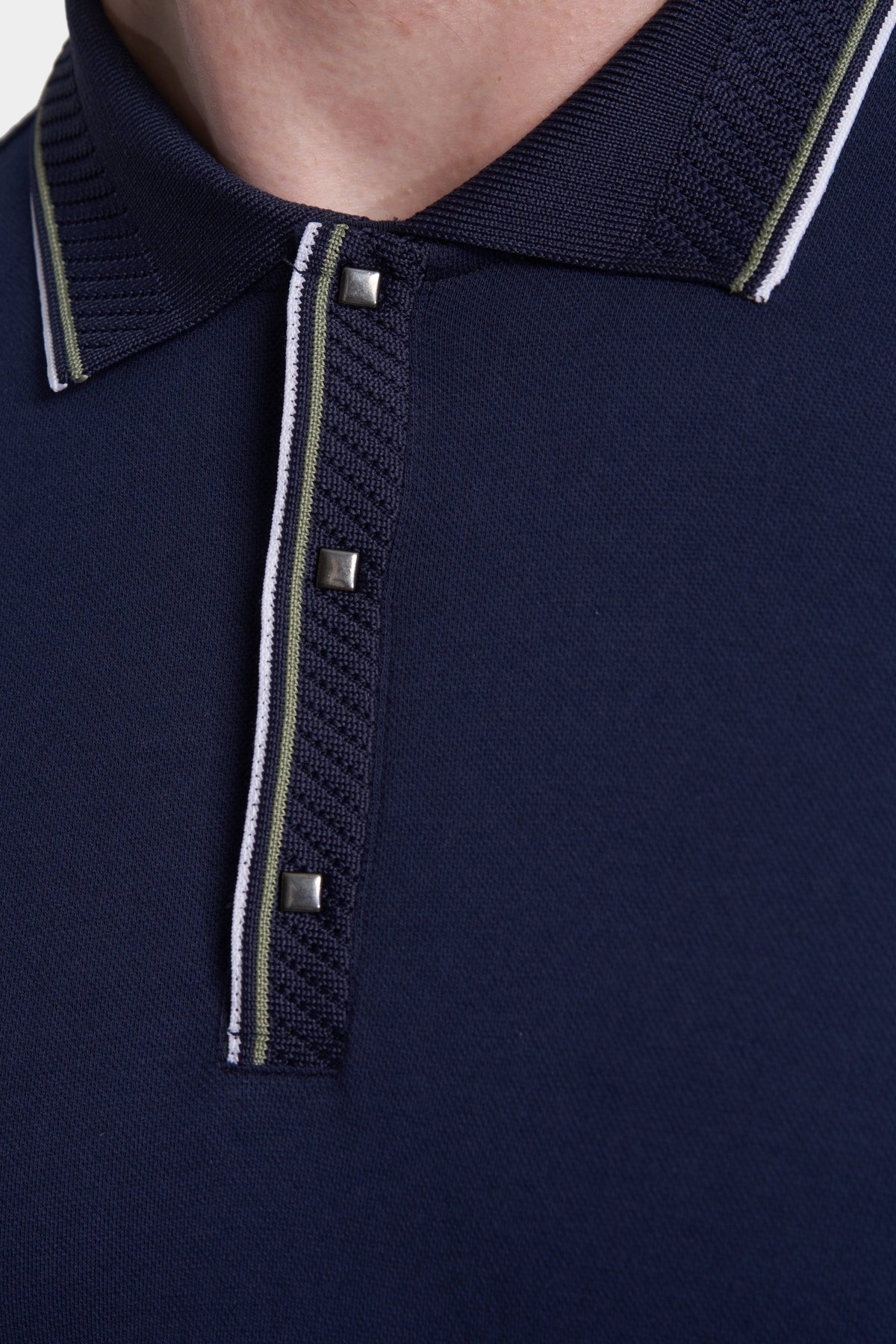Navy polo shirt with ribbed collar and striped button placket detail