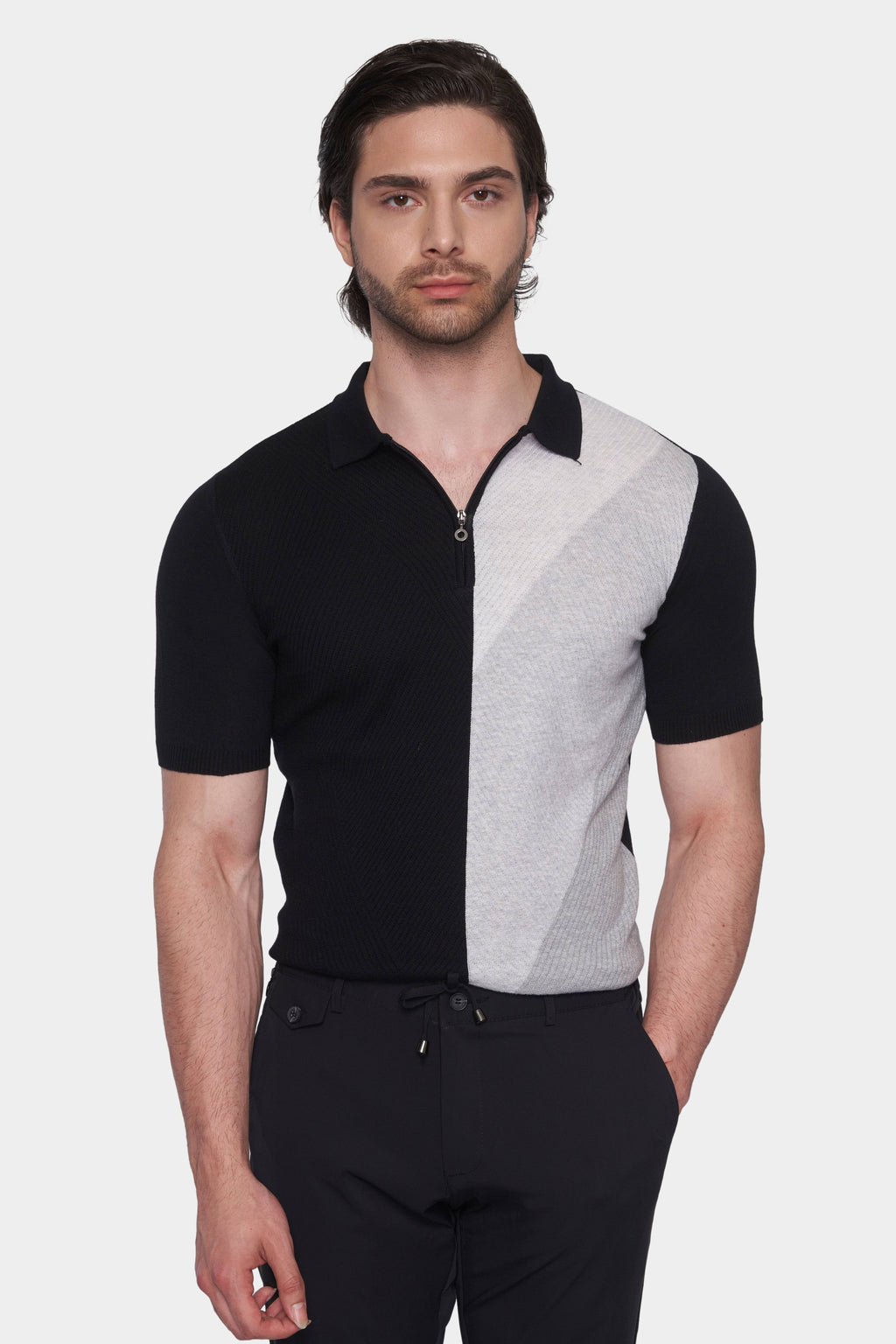 Black and white knit cotton polo with zip placket and ribbed collar