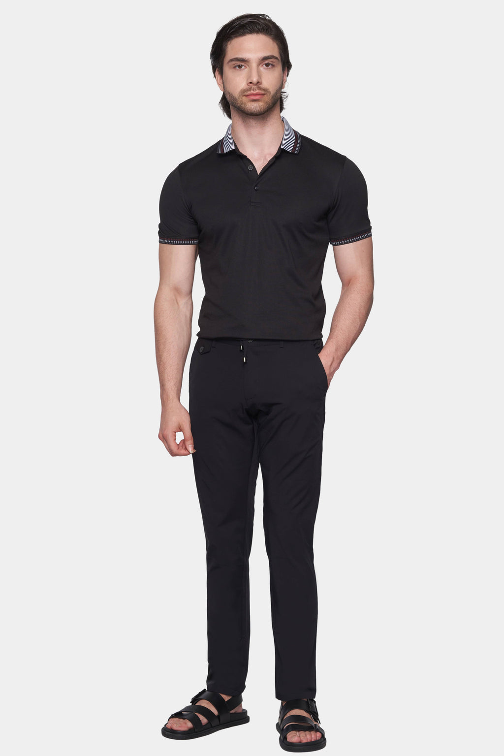Men's black cotton polo with striped collar trim and matching cuff trim