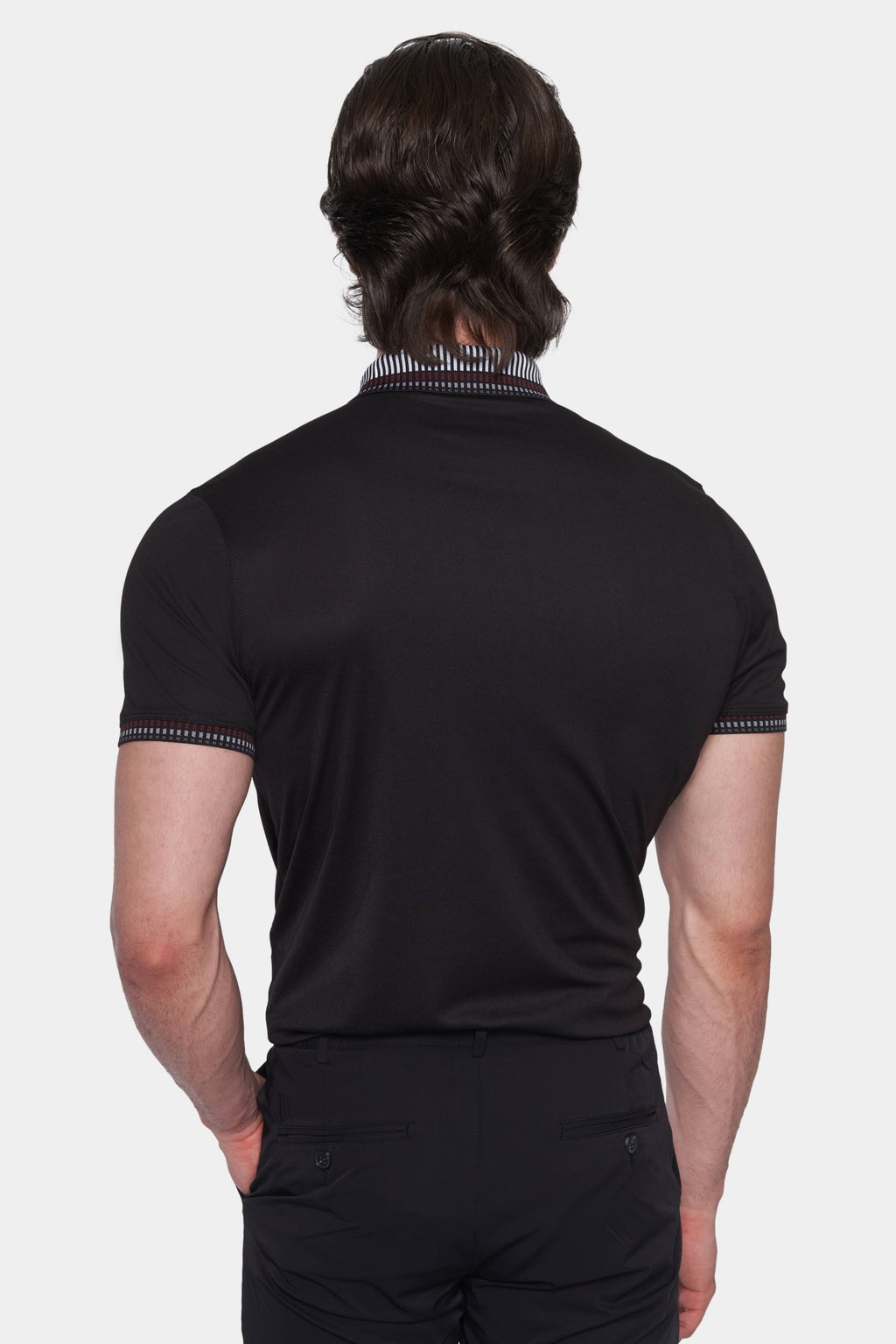 Back view of men's black cotton polo with striped collar and sleeve cuff trim