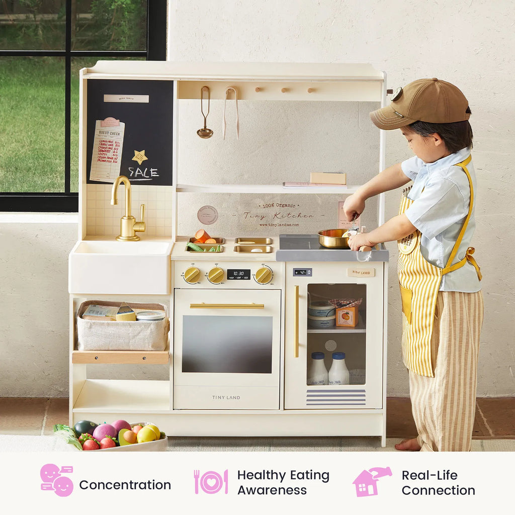White play bistro kitchen with faucet, oven, storage drawers, and cookware