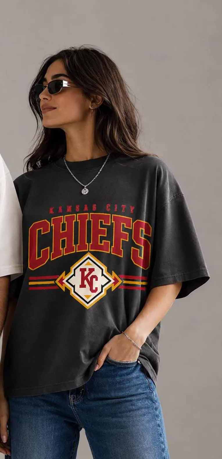 Dark graphic T-shirt with Chiefs shield logo and large CHIEFS lettering