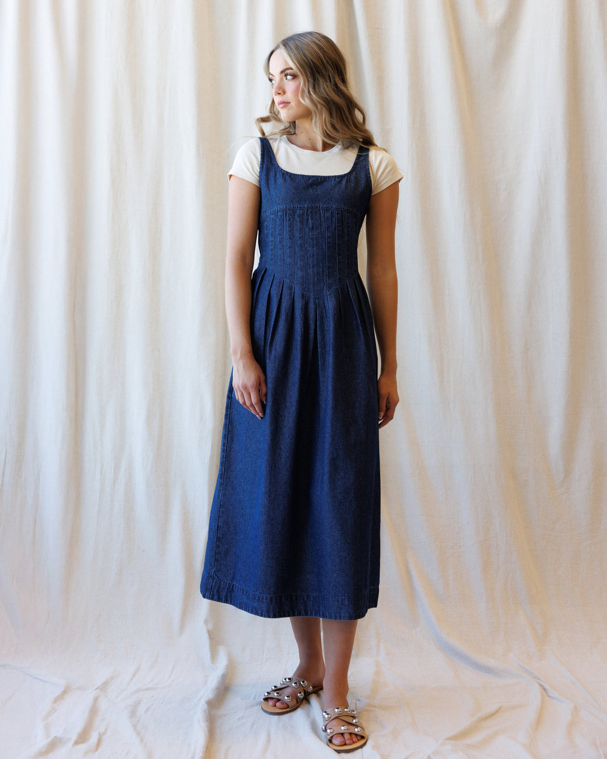 Blue denim midi dress with square neckline and gathered skirt