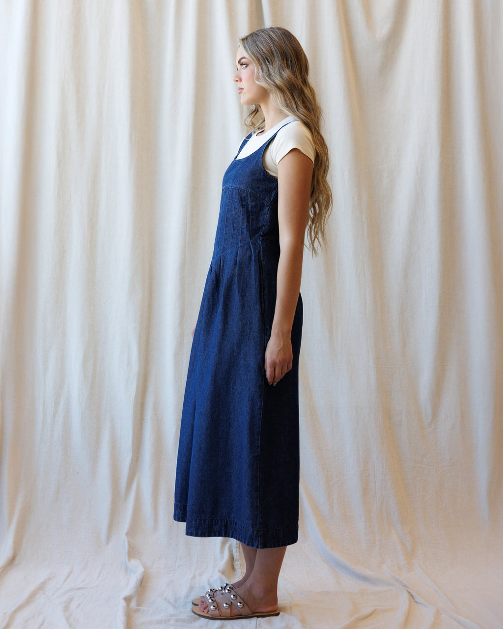Blue denim dress with cap sleeves and midi length, square scooped neckline