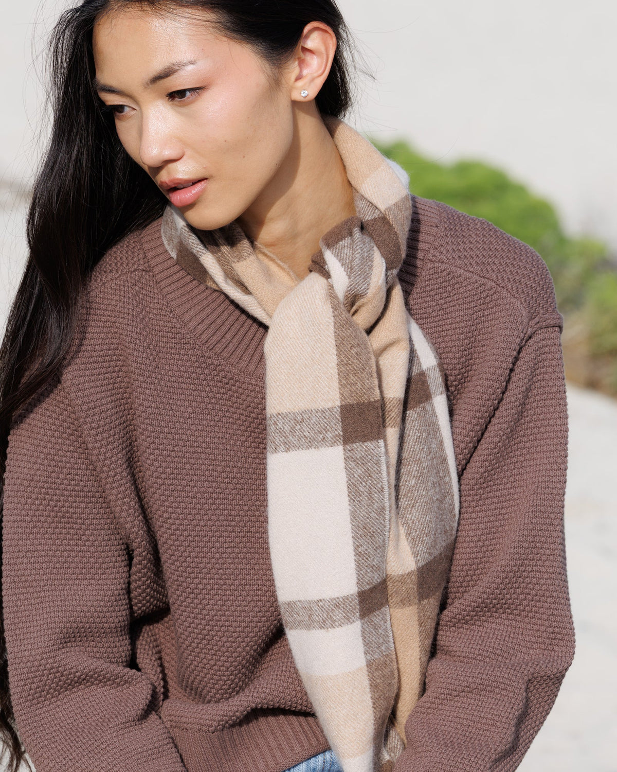 Plaid scarf in cream, tan, and brown with fringed ends